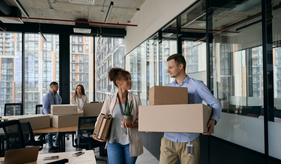 Young company employees preparing for office moving