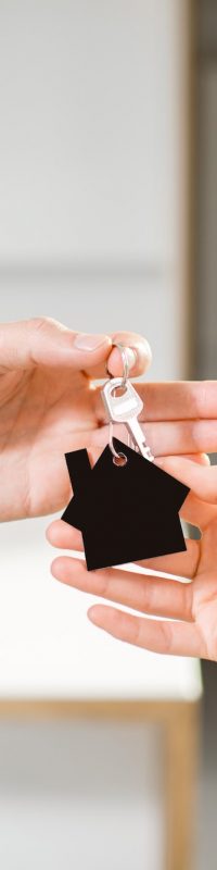 Holding keys with house keychain